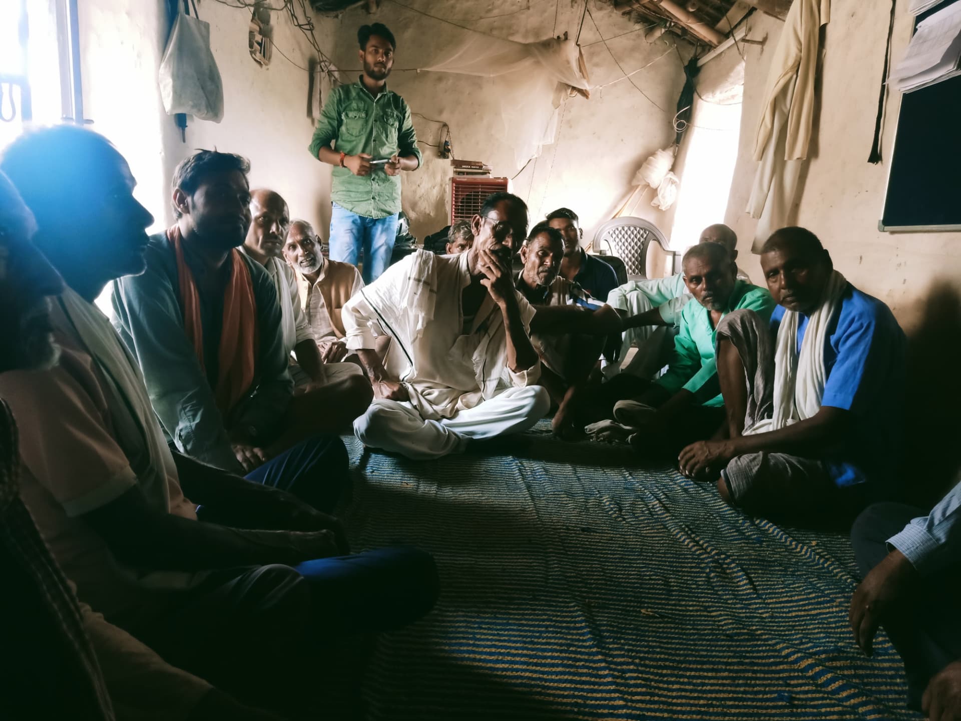 Farmers gathered for a discussion inside the village chaupal at Para